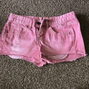 red jean shorts